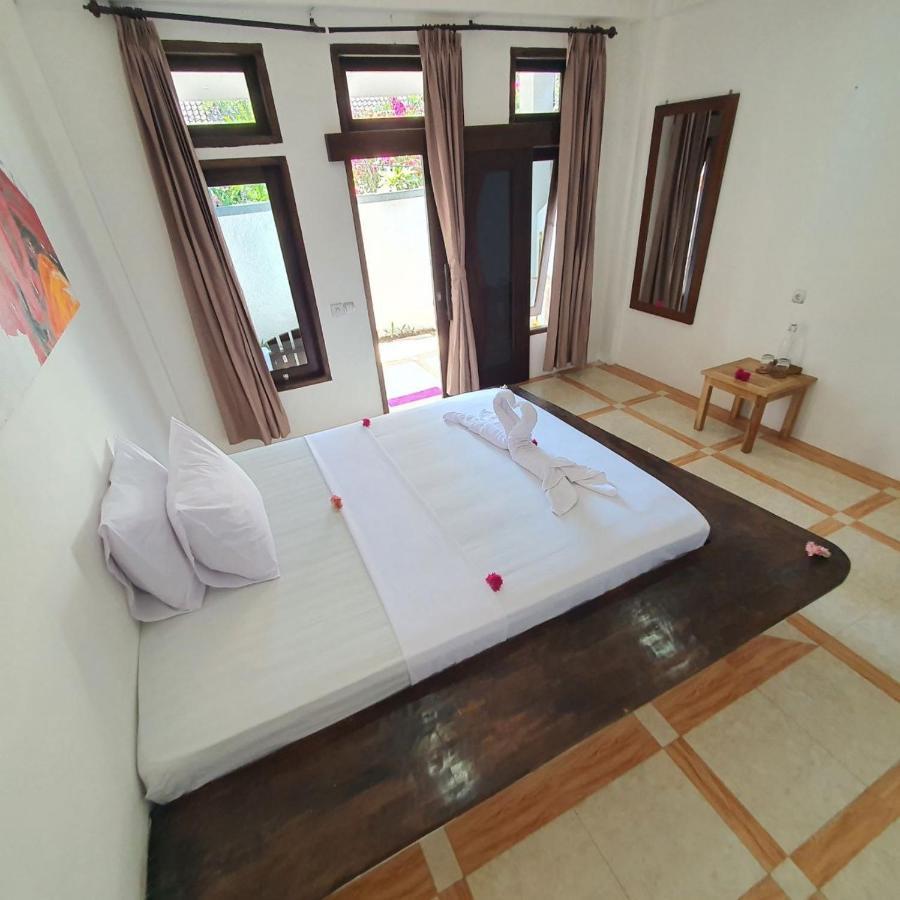 Putra Boyan Cottages غيلي تراوانغان المظهر الخارجي الصورة